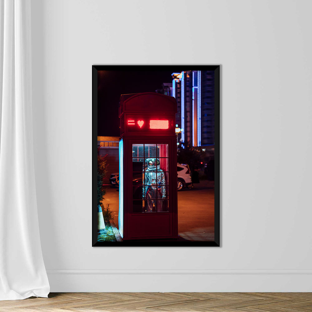 Spaceman standing in a telephone box at night - Image 3