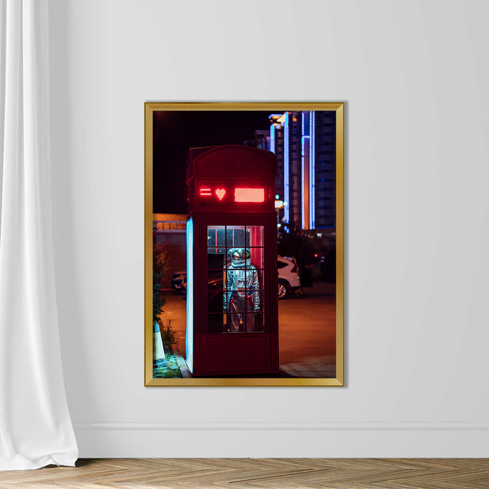 Spaceman standing in a telephone box at night - Image 5