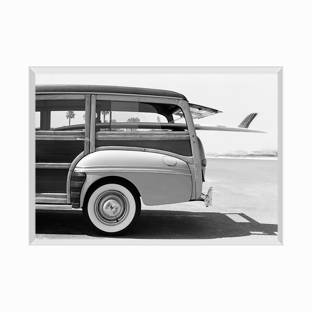 Old Woodie Station Wagon with Surfboard