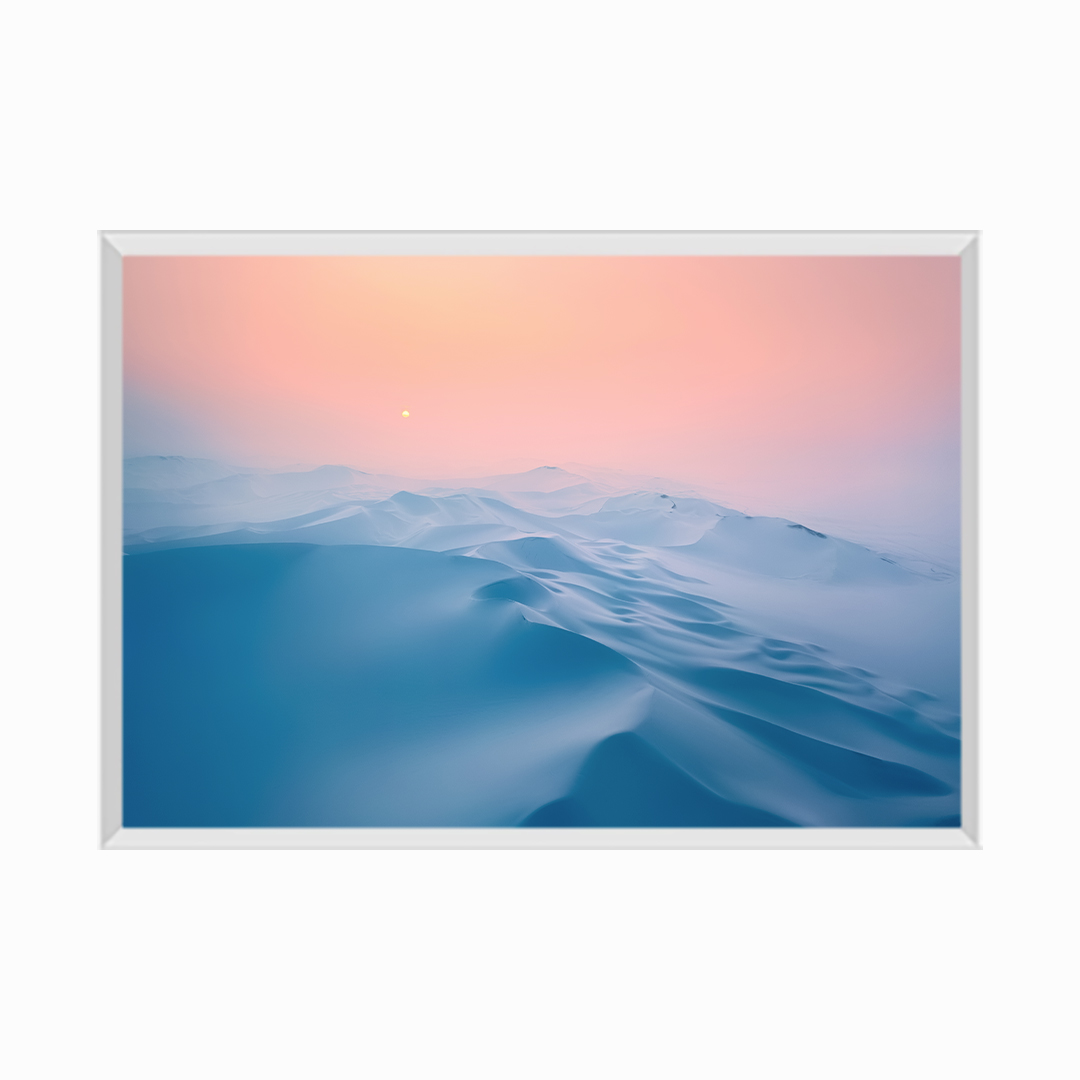 Snow covered desert sand dunes at sunset in winter