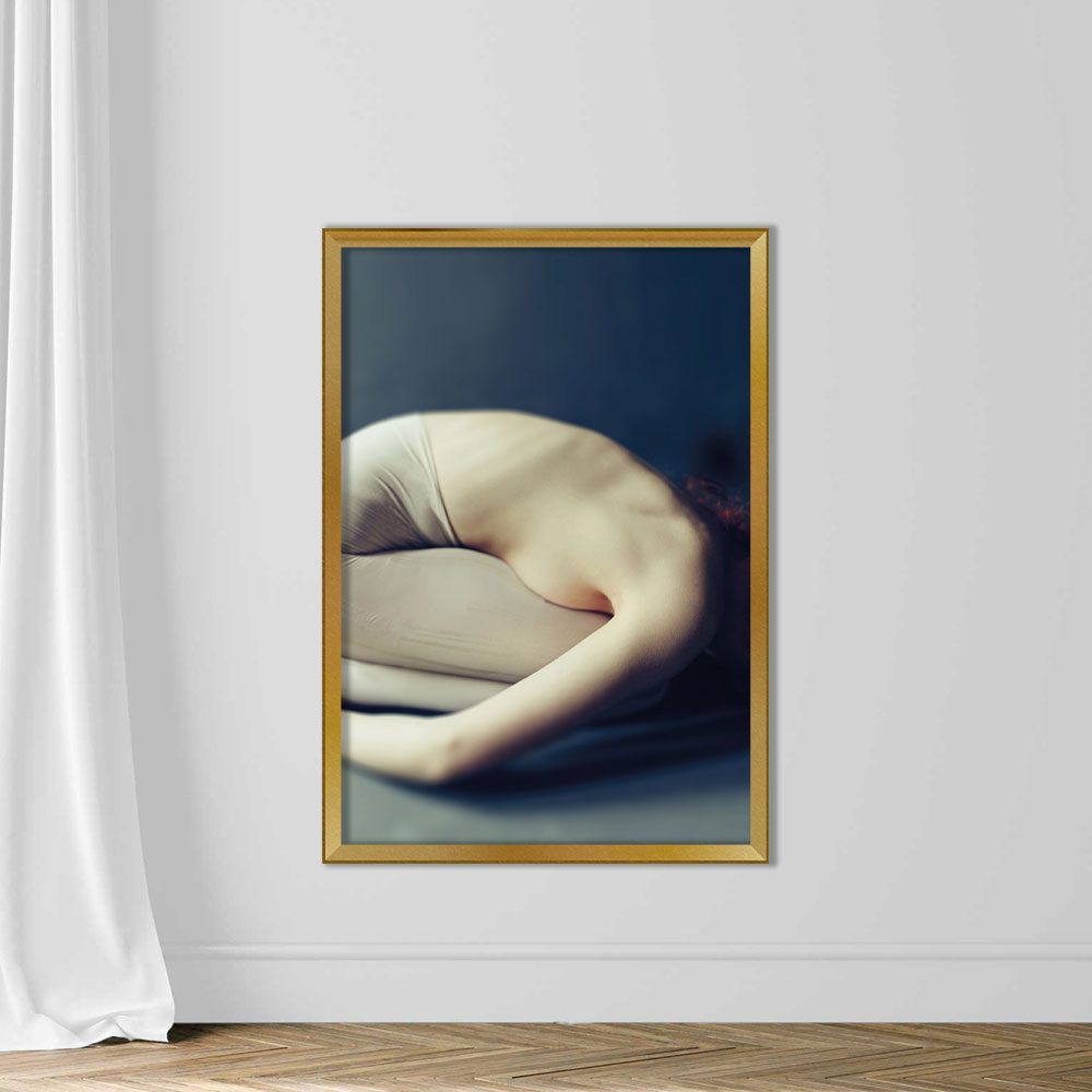 Woman curled up in the fetal position - Image 5