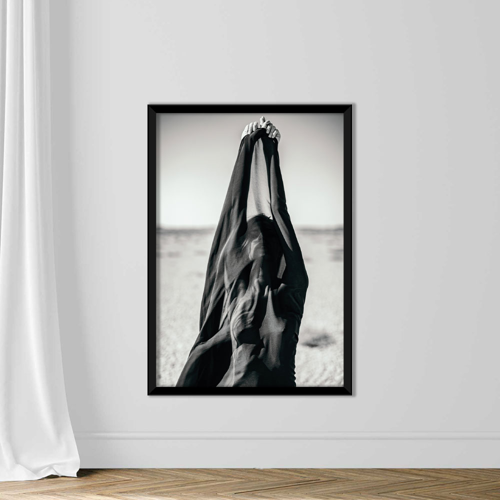 Artistic abstract portrait of woman covered with black fabric in desert - Image 3