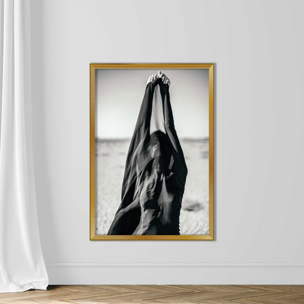 Artistic abstract portrait of woman covered with black fabric in desert - Image 5