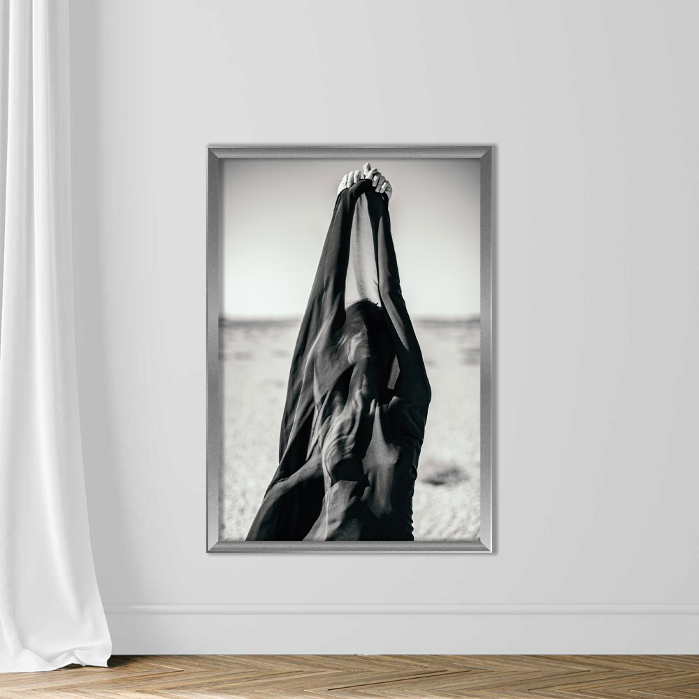 Artistic abstract portrait of woman covered with black fabric in desert - Image 4